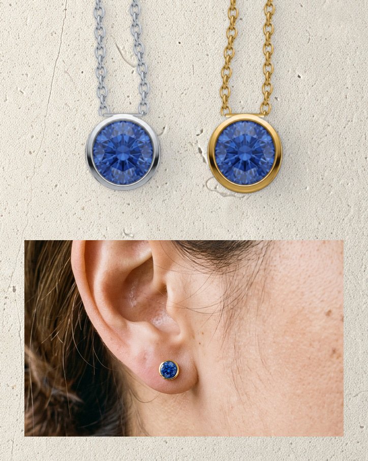 Ear with a Corund stud above the silver and vermeil pendants
