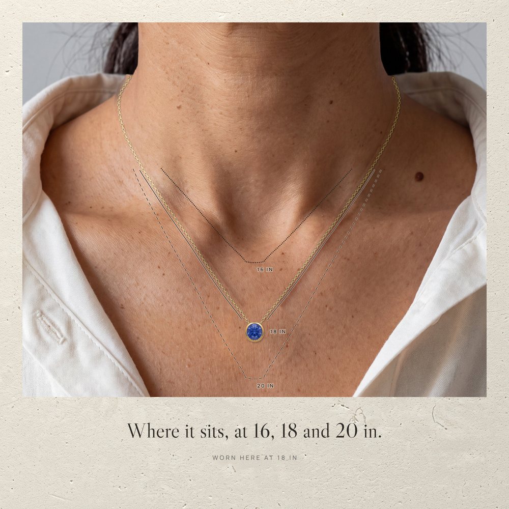 Neck wearing the Corund vermeil pendant on the 18 in chain, lines for other lengths