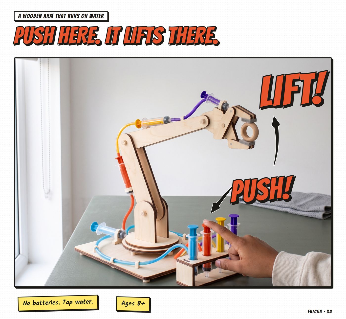 Full-width splash: 'Push here. It lifts there.', the arm by the window lifting a ring, a child's hand on the poppy plunger, the words PUSH and LIFT, stickies 'No batteries. Tap water.' and 'Ages 8+'