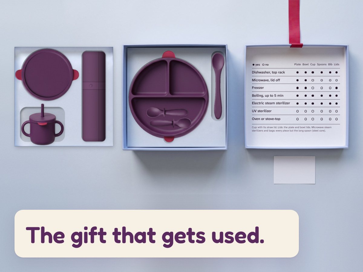Open Linnet gift box from above with the set inside and the care table in the lid