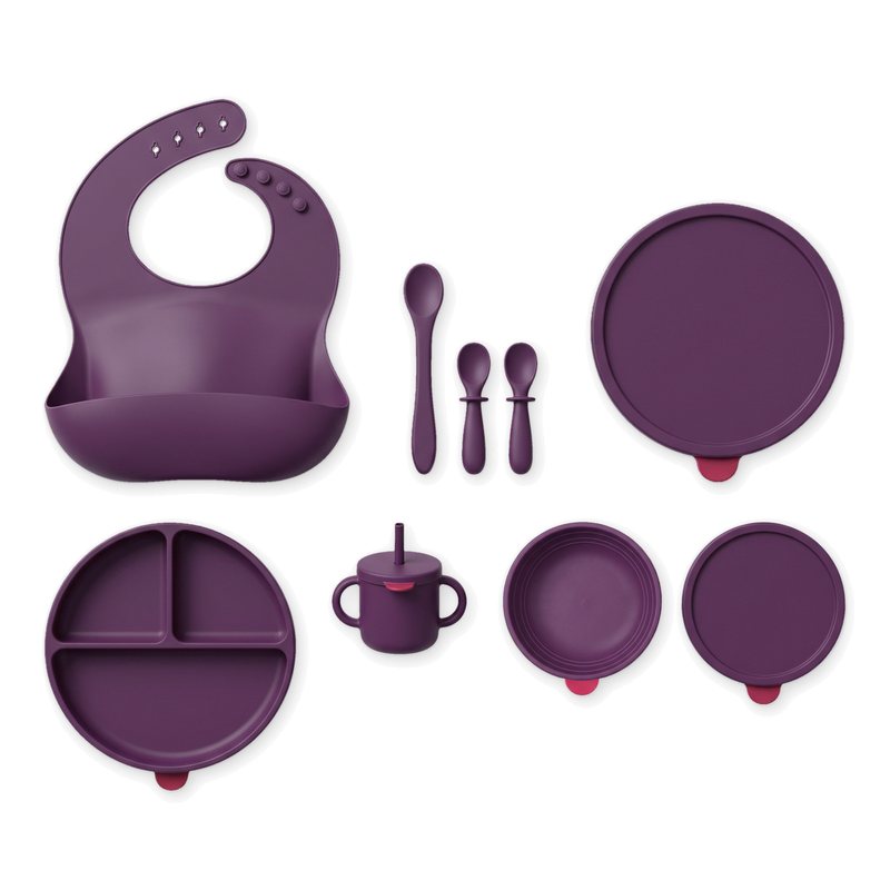 Linnet 7-piece silicone feeding set with 3 lids in Damson on white: plate, bowl, cup, 3 spoons, bib