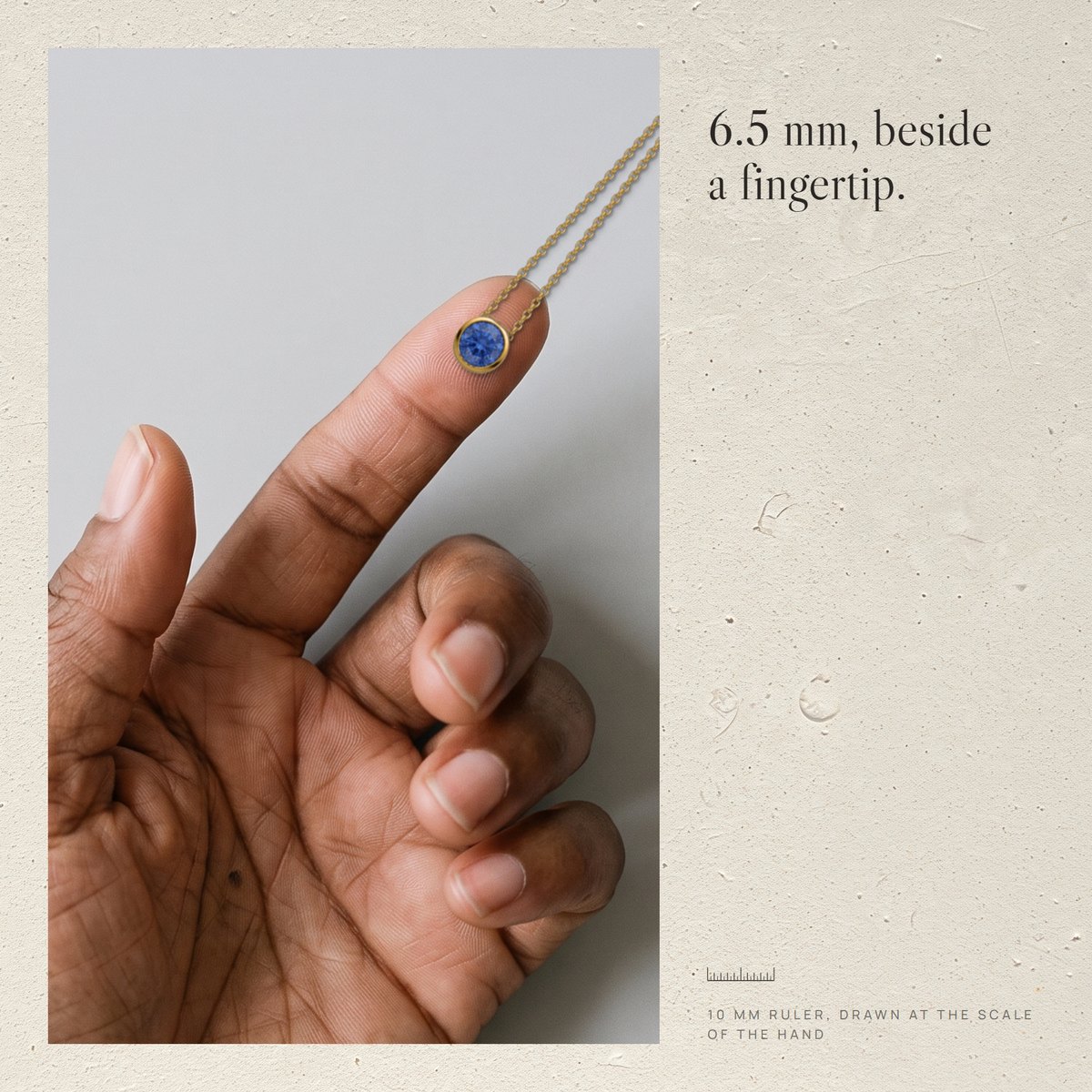 AI-generated fingertip with the Corund pendant and a 10 mm ruler at the same scale