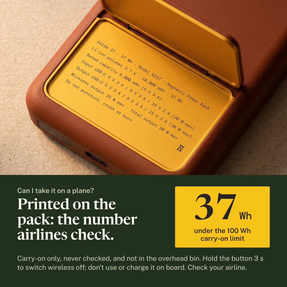 Close-up of the Kelda 37 stand open on the marigold inlay, the printed label reads 37 Wh